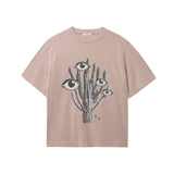 Beige T-shirt with black and white cactus print in the middle
