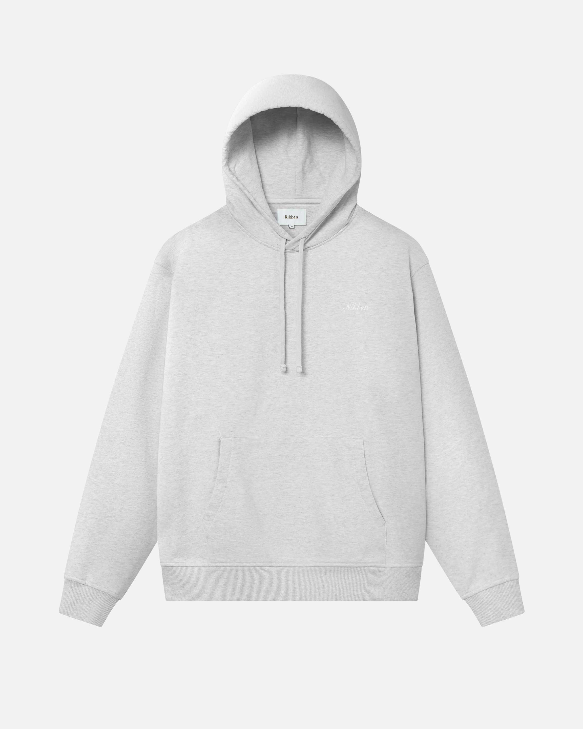 Grey hoodie with drawstrings, chest pocket, ribbed cuffs, and Nikben script logo embroidery