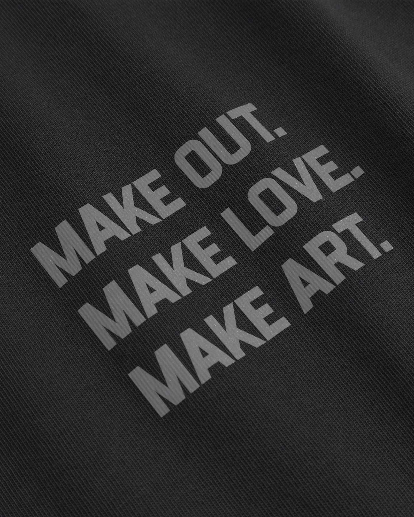 Close up of text print on a black t-shirt