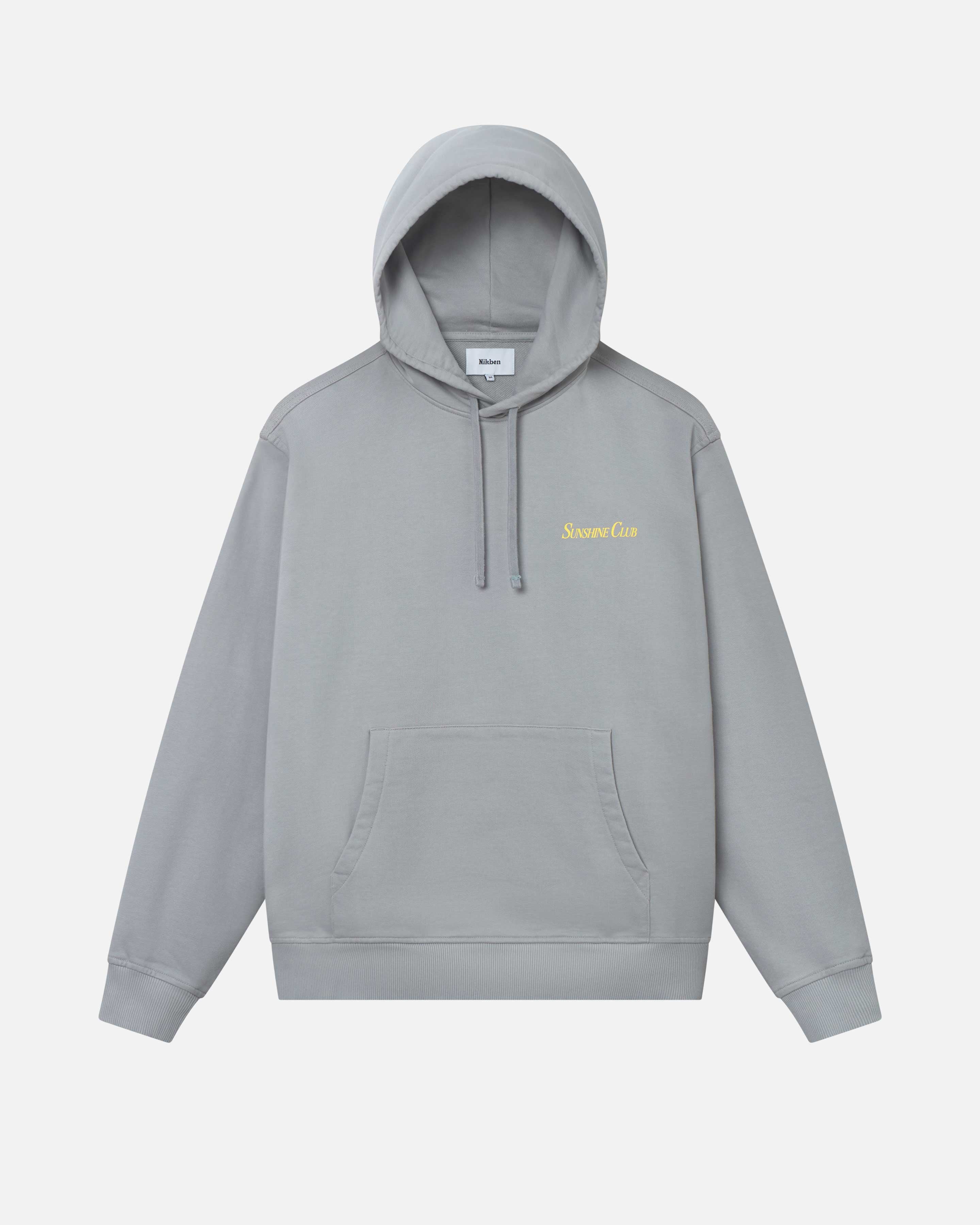 Grey hoodie with  drawstrings, chest pocket, ribbed cuffs and yellow Nikben sunshine print