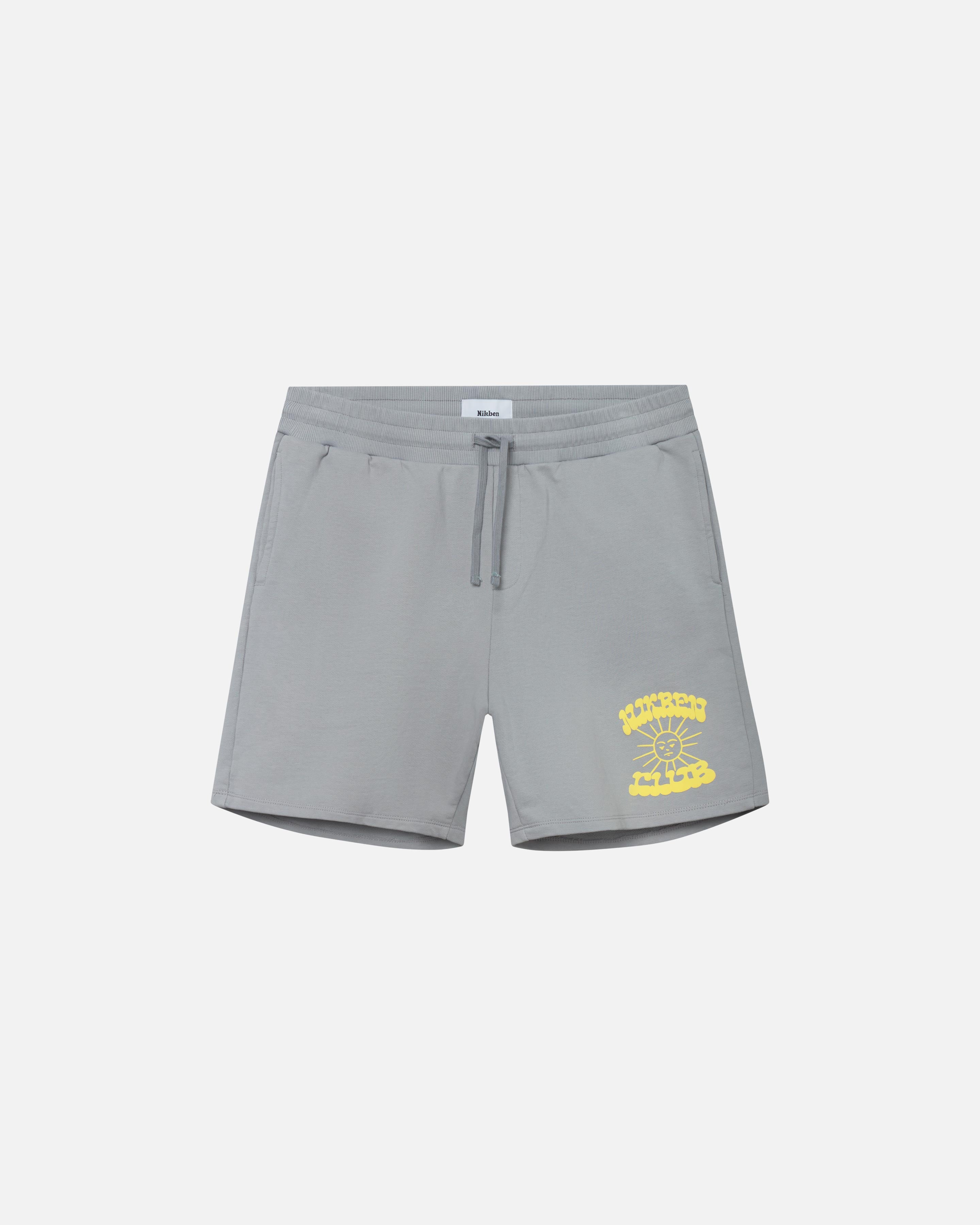 Grey sweat shorts with drawstrings and yellow Nikben Sunshine Club print 