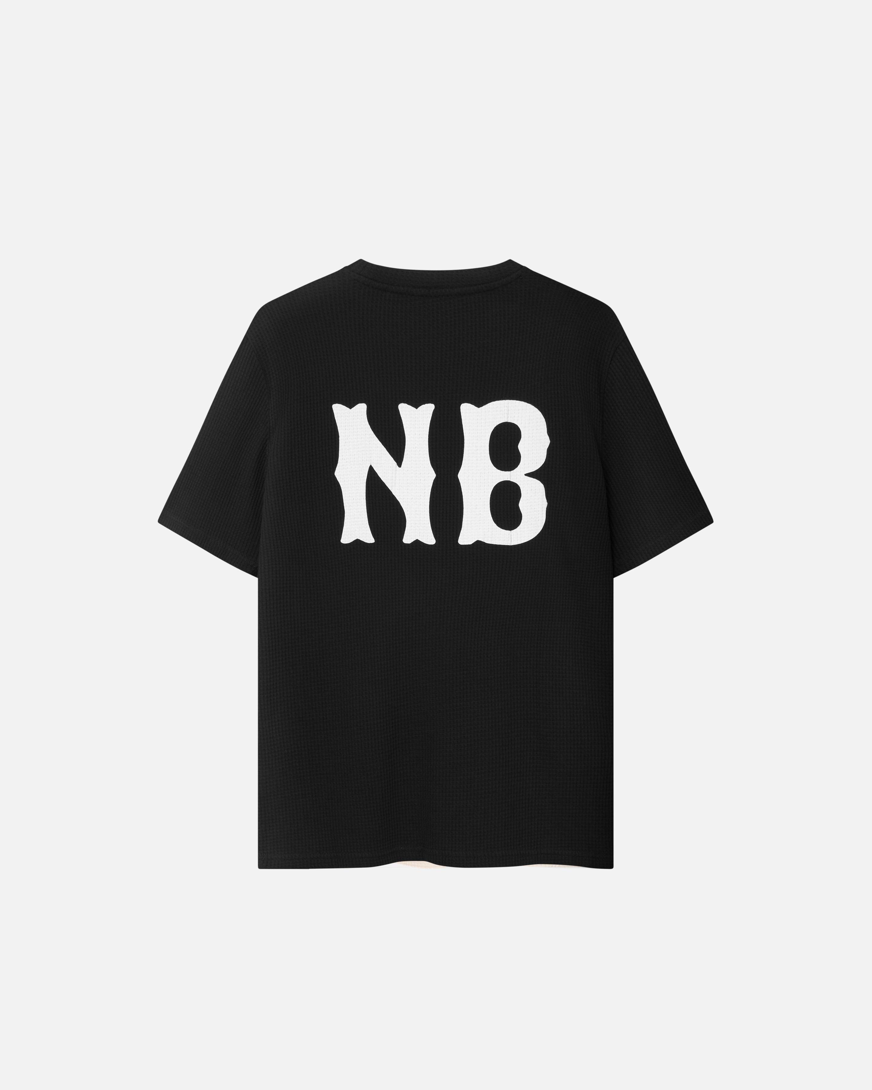 back of a black waffle patterned t-shirt with NB logo print