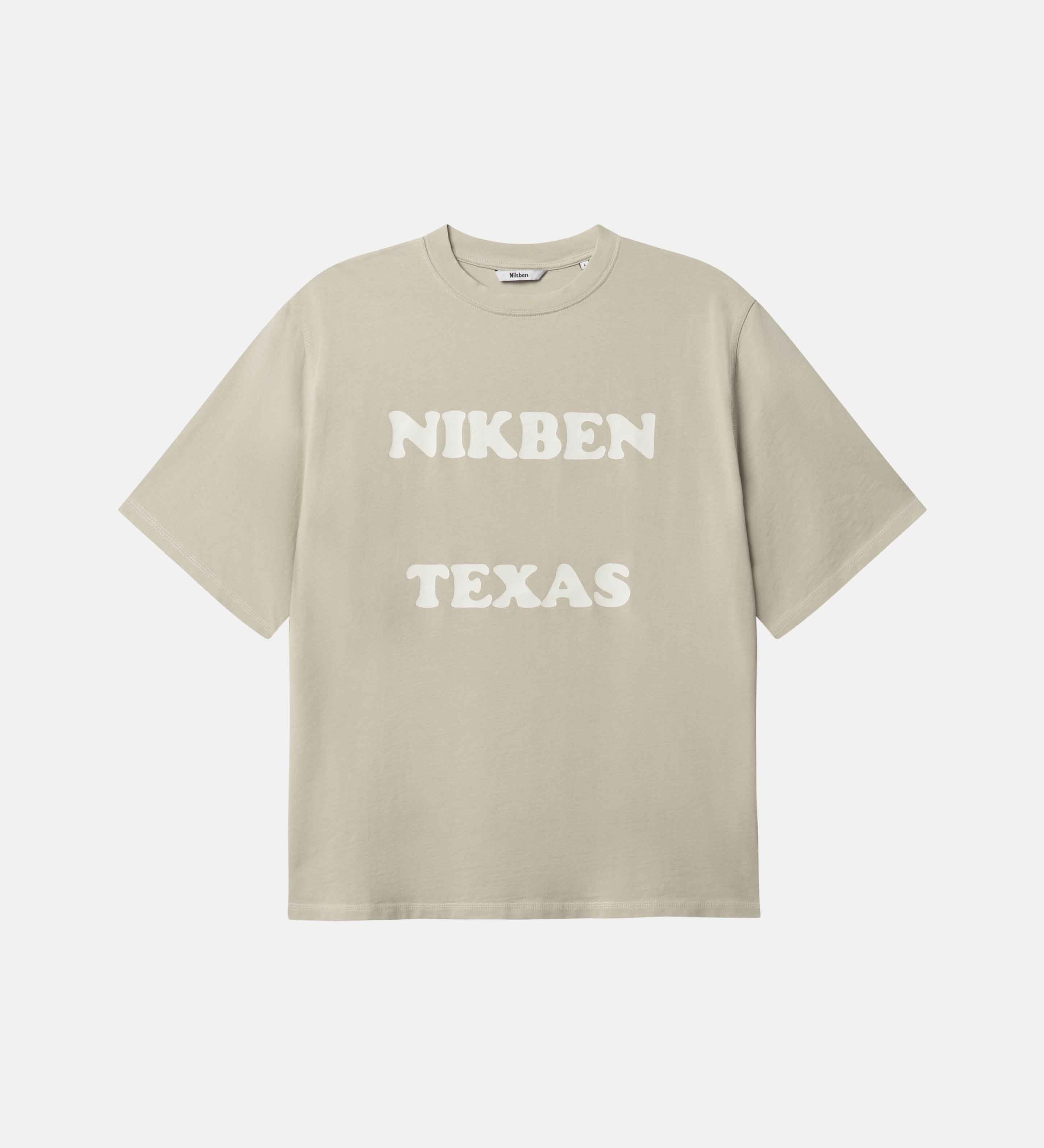Beige t-shirt with 'NIKBEN TEXAS' text on the front
