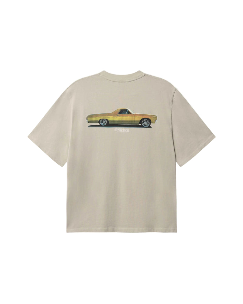 Beige t-shirt with a yellow vintage truck graphic on back of t-shirt