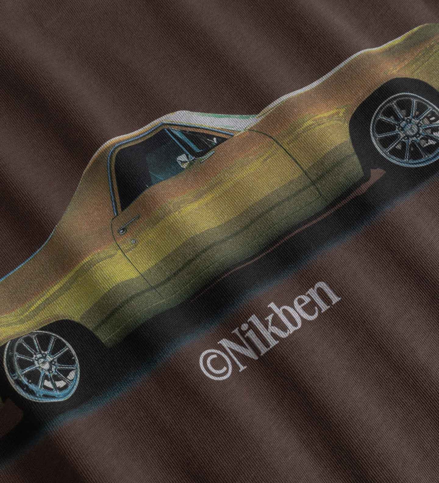 Close-up of car design and 'Nikben' branding.