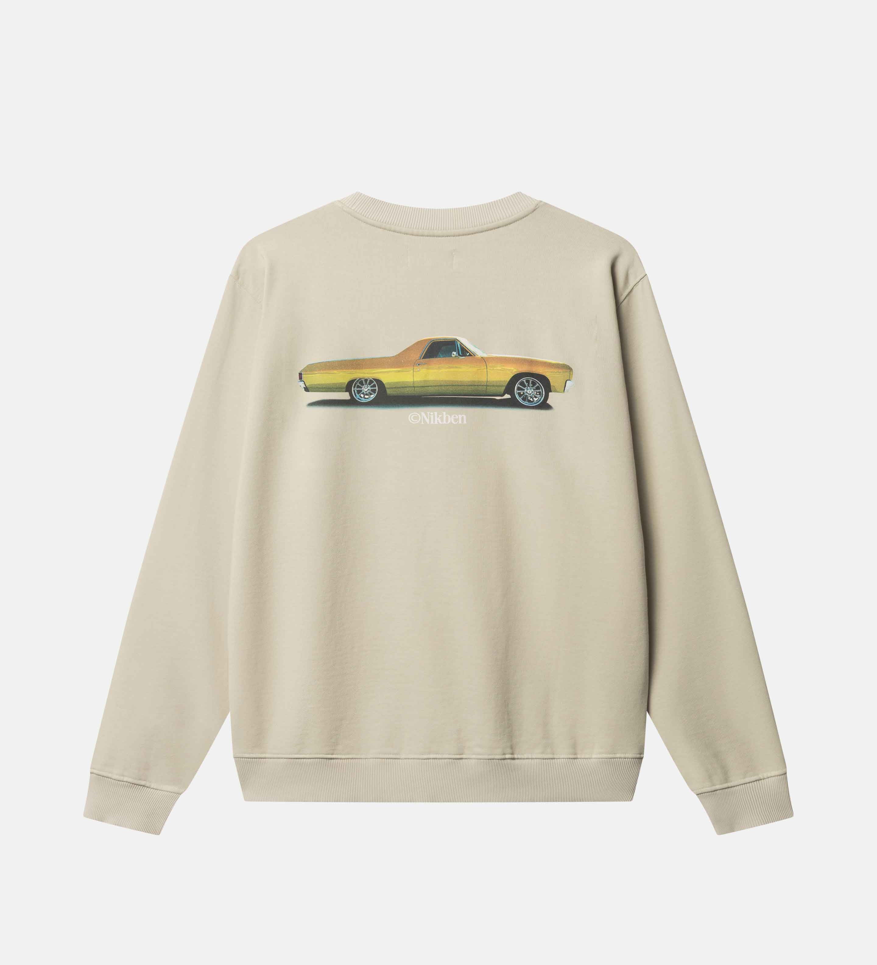 Beige sweatshirt with a yellow car graphic on the back 