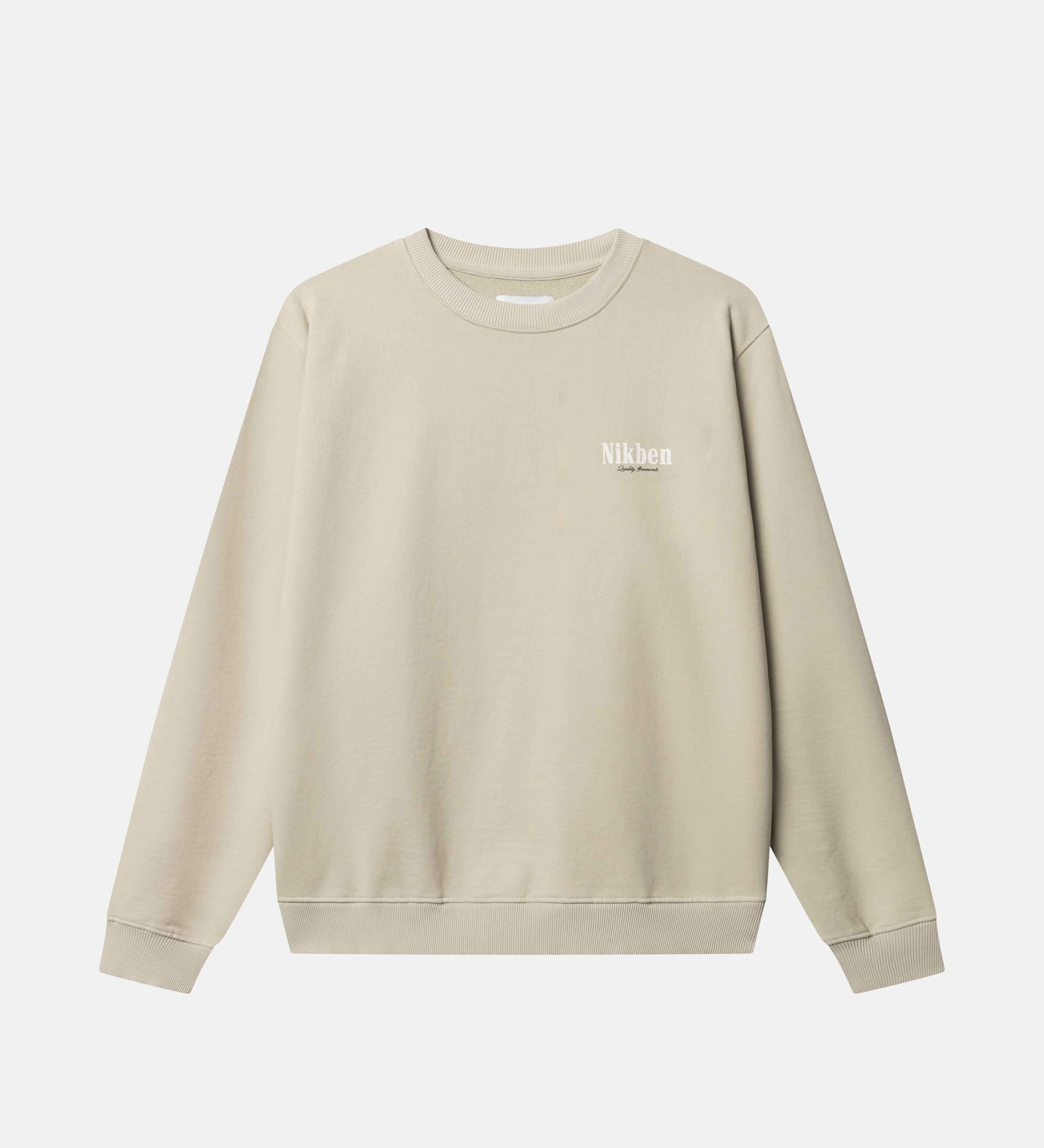 Beige sweatshirt with a logo on chest.