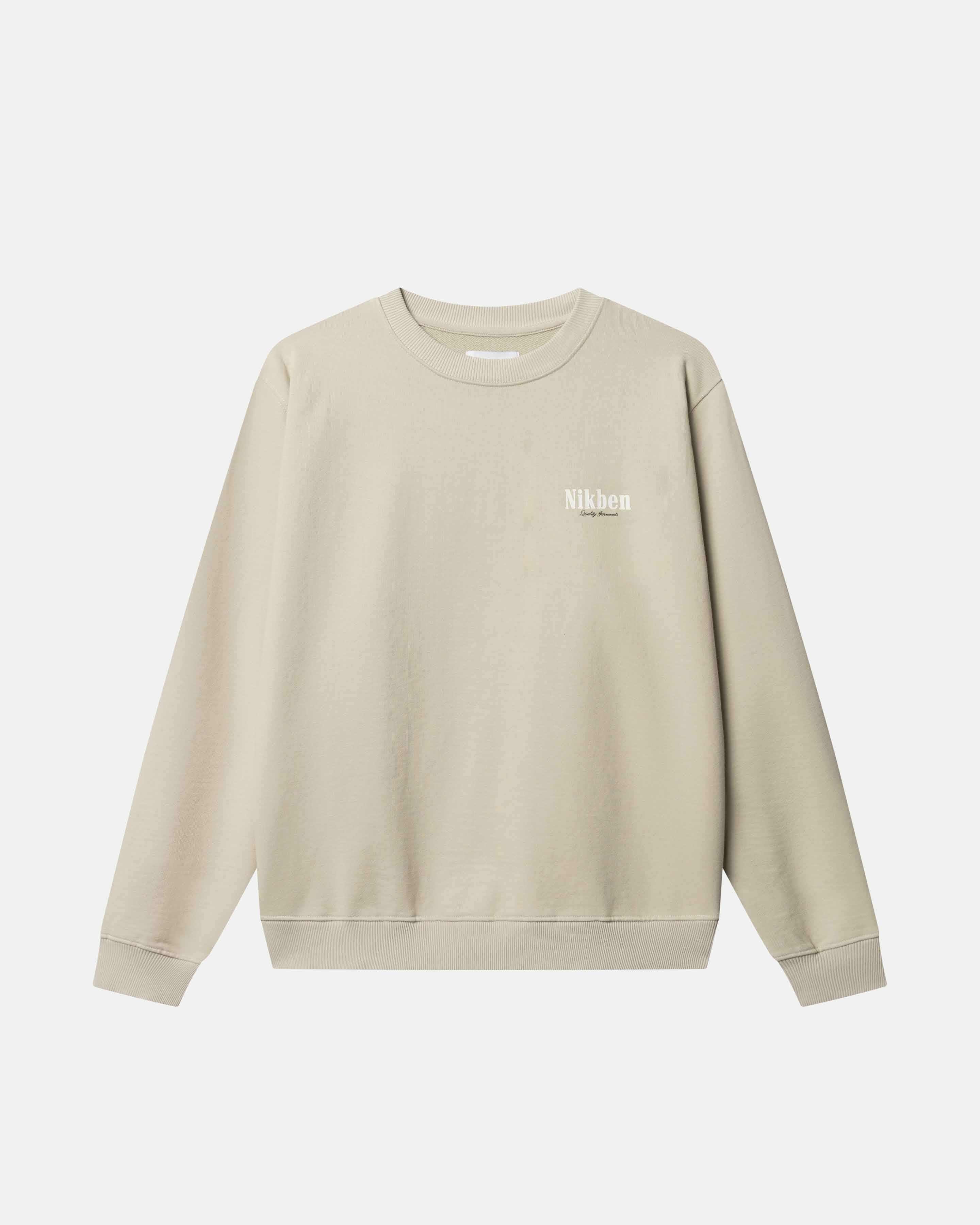 Beige sweatshirt with a logo on chest.