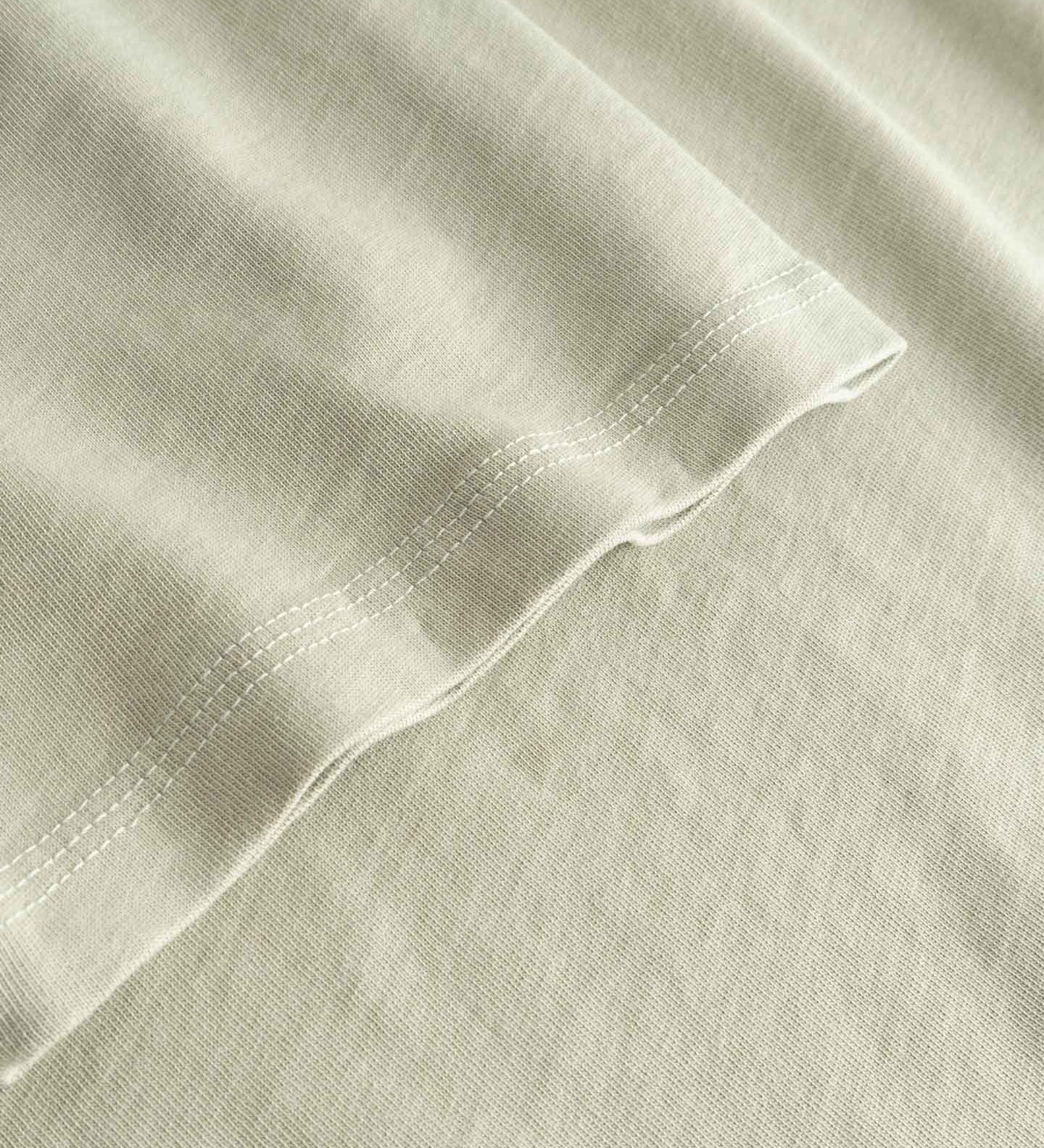 Close-up of beige fabric with a subtle texture