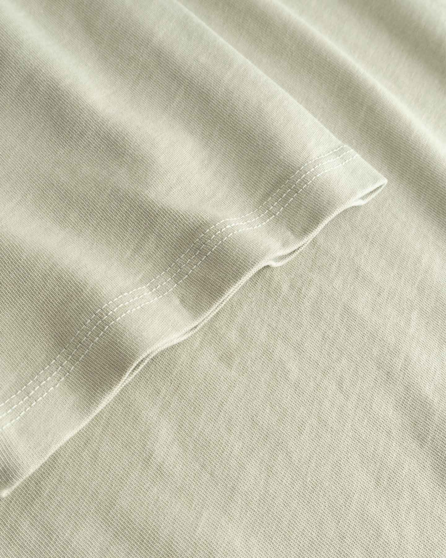 Close-up of beige fabric with a subtle texture