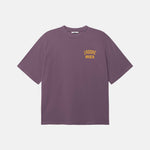 Purple t-shirt with yellow text on front breast pocket