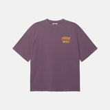 Purple t-shirt with yellow text on front breast pocket