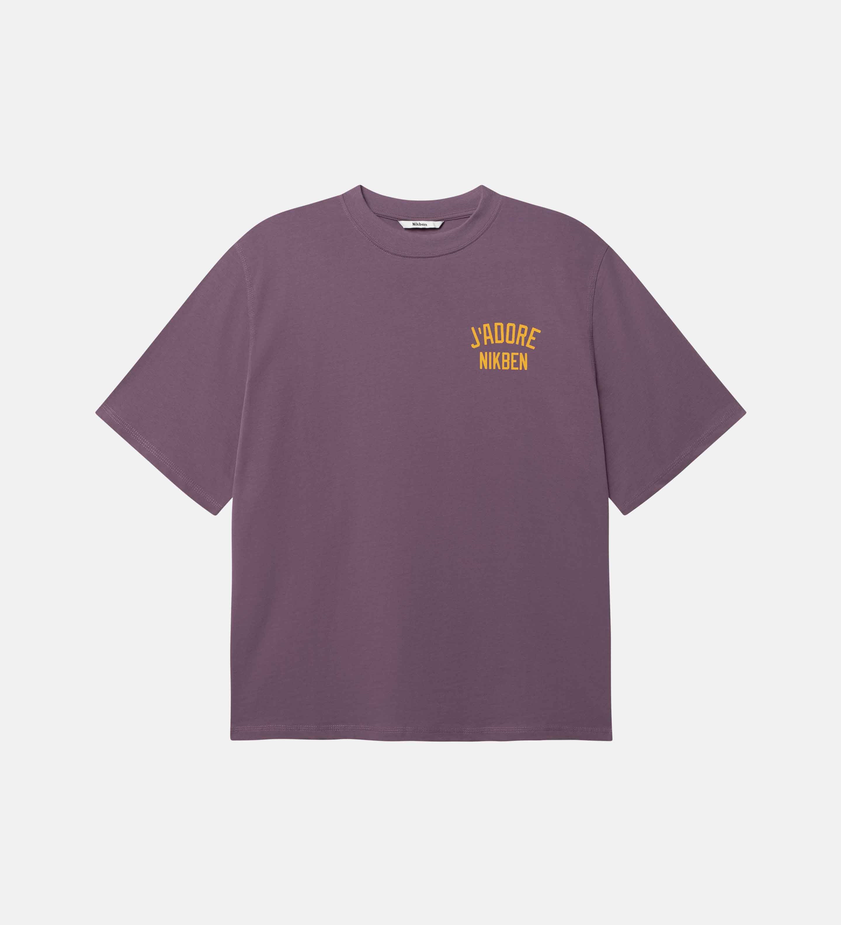 Purple t-shirt with yellow text on front breast pocket