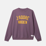 Purple sweatshirt with yellow text on Chest ´j'adore NIKBEN'