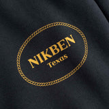 Nikben Texas logo on a black fabric background