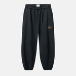 Black jogger pants with a small logo on leg