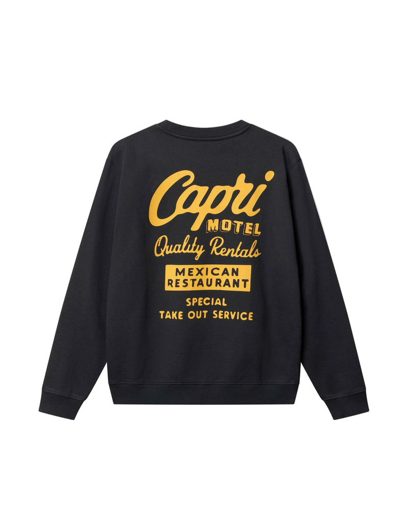 Black sweatshirt with yellow text on a light gray background