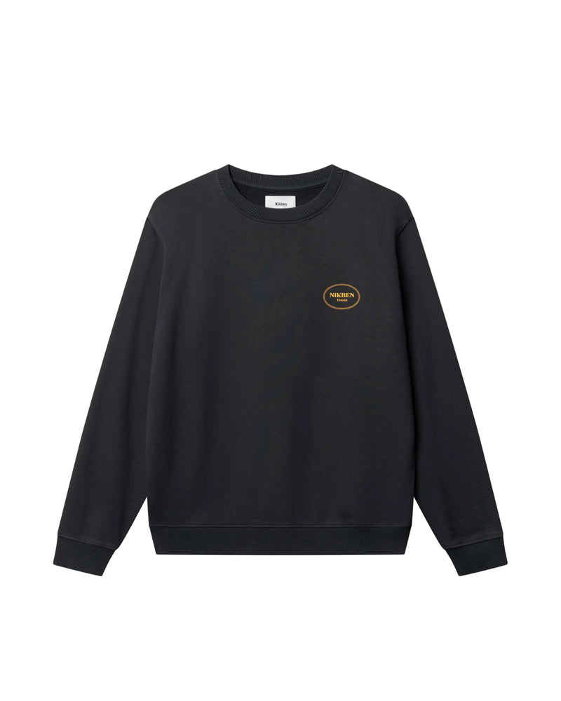 Black sweatshirt with a logo on a light gray background