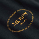 Close Up Of Small Yellow Logo on chest of Black - T-shirt 