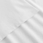 Close-up of white fabric with hem