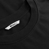 Black t-shirt with a Nikken label on the collar