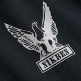 Nikben logo with an eagle design on black fabric