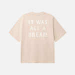 Beige t-shirt with 'IT WAS ALL A DREAM' text in white on back 