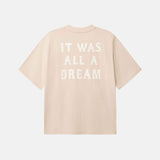 Beige t-shirt with 'IT WAS ALL A DREAM' text in white on back 