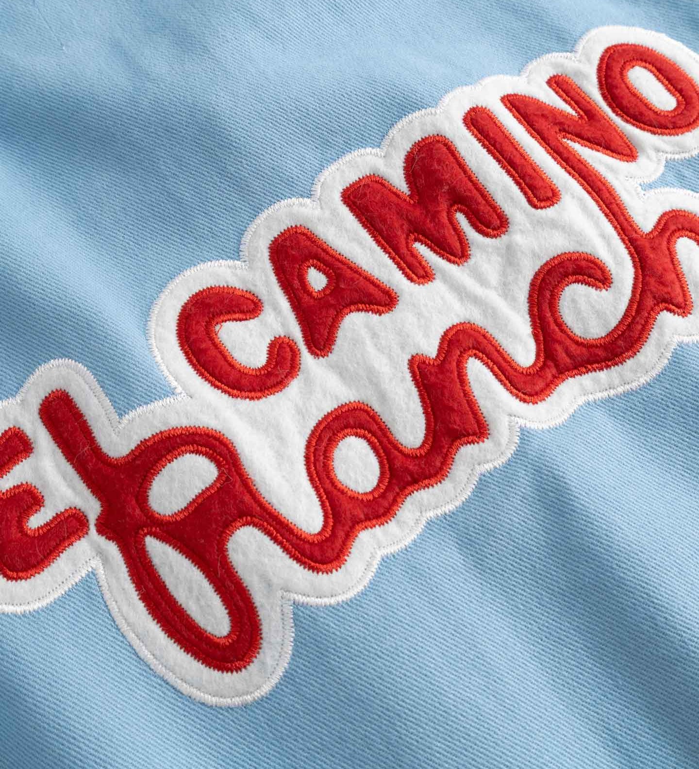 Close up of red 'El Camino' logo on back.