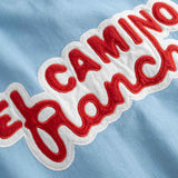 Close up of red 'El Camino' logo on back.