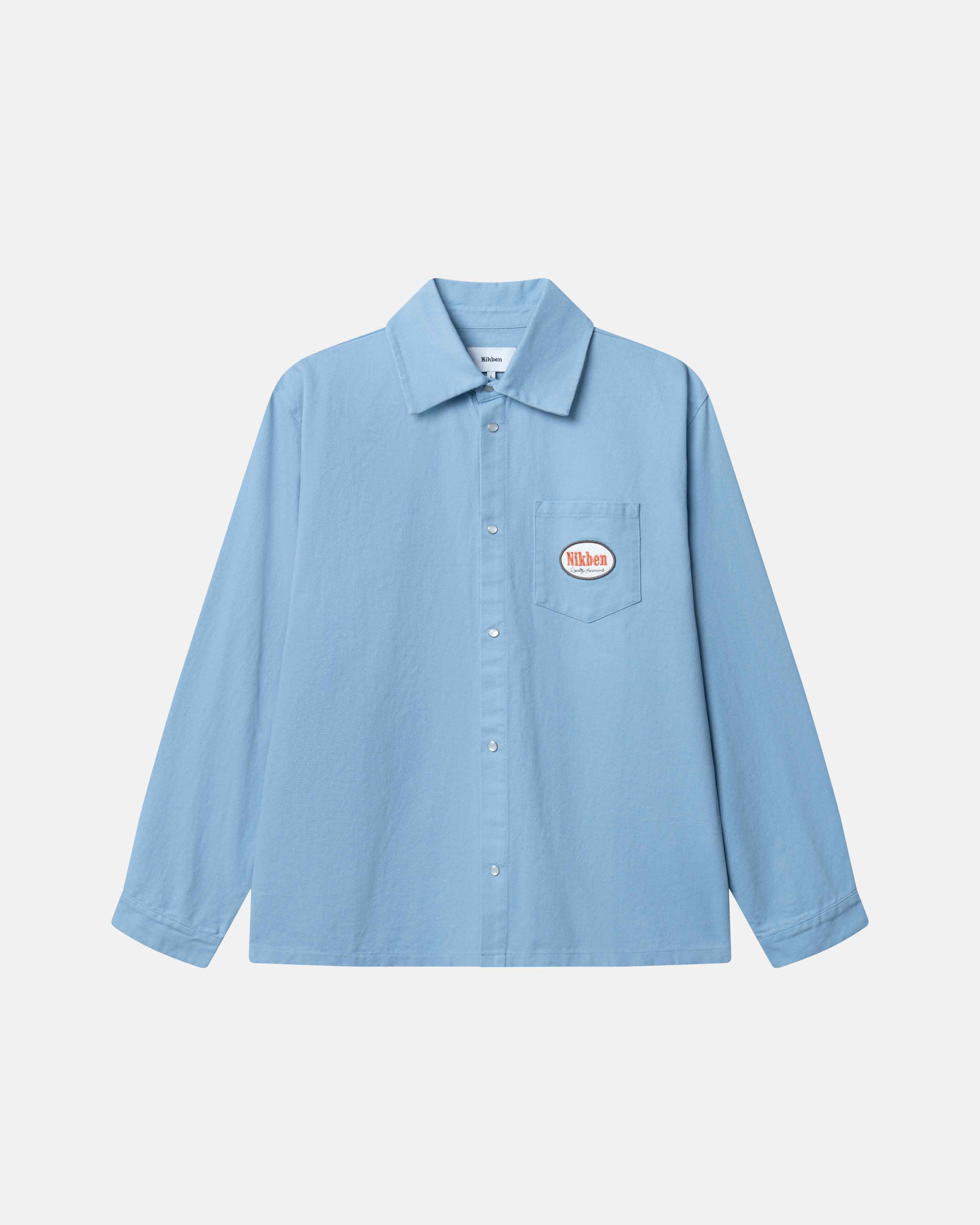 Light blue overshirt  with logo on front breast pocket