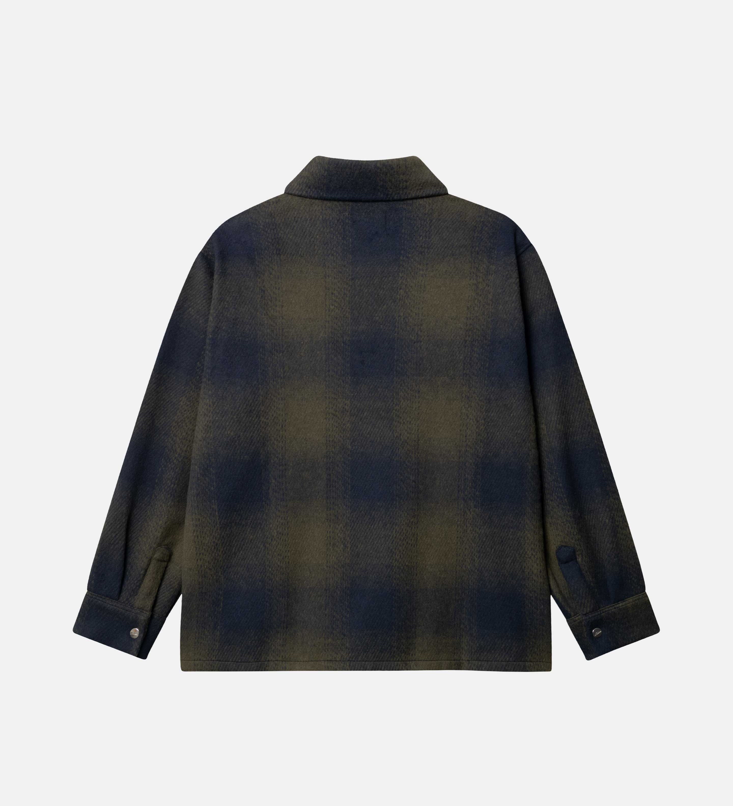 Back detail of dark blue and green flannel shirt