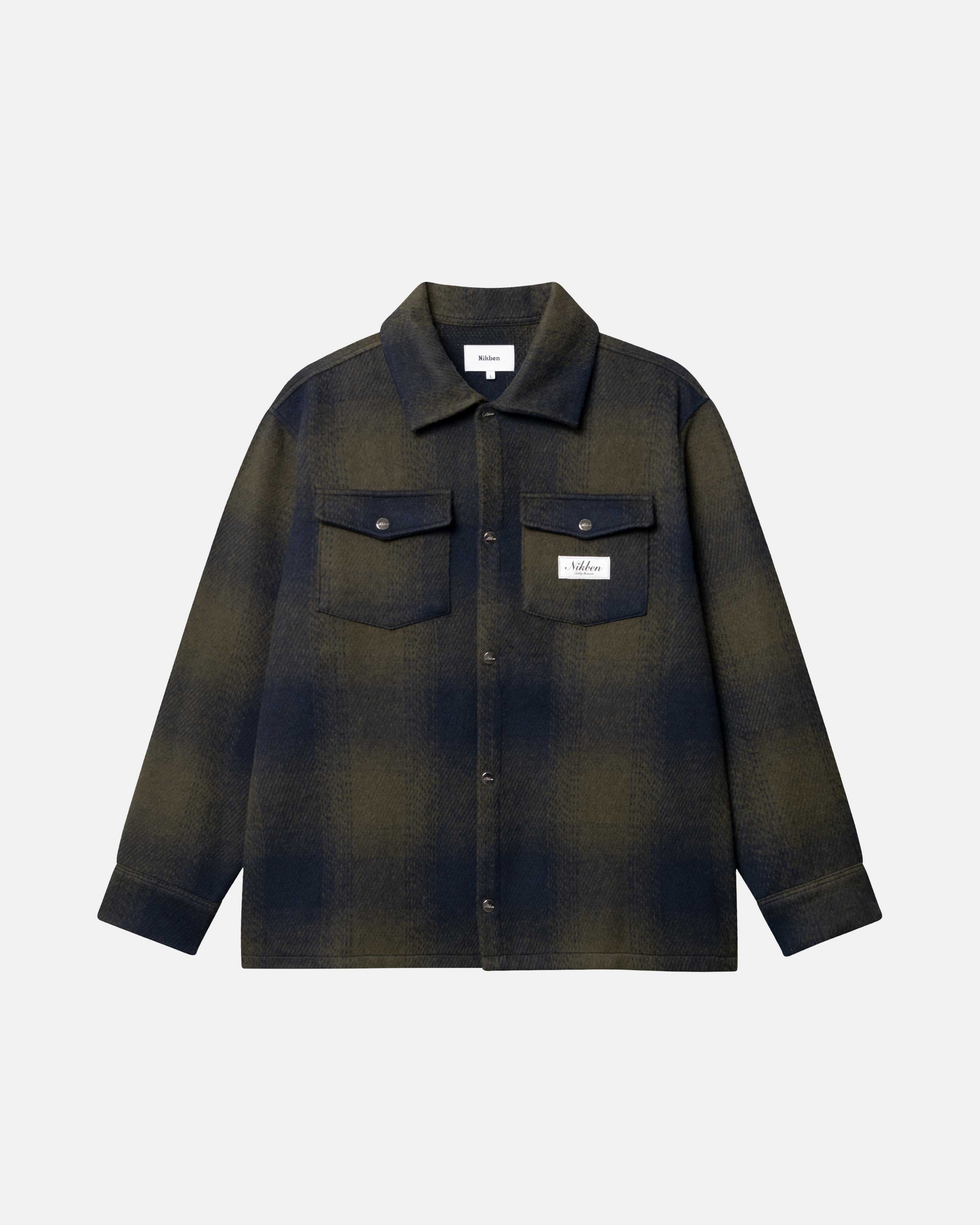 Dark blue and green flannel shirt with front pockets