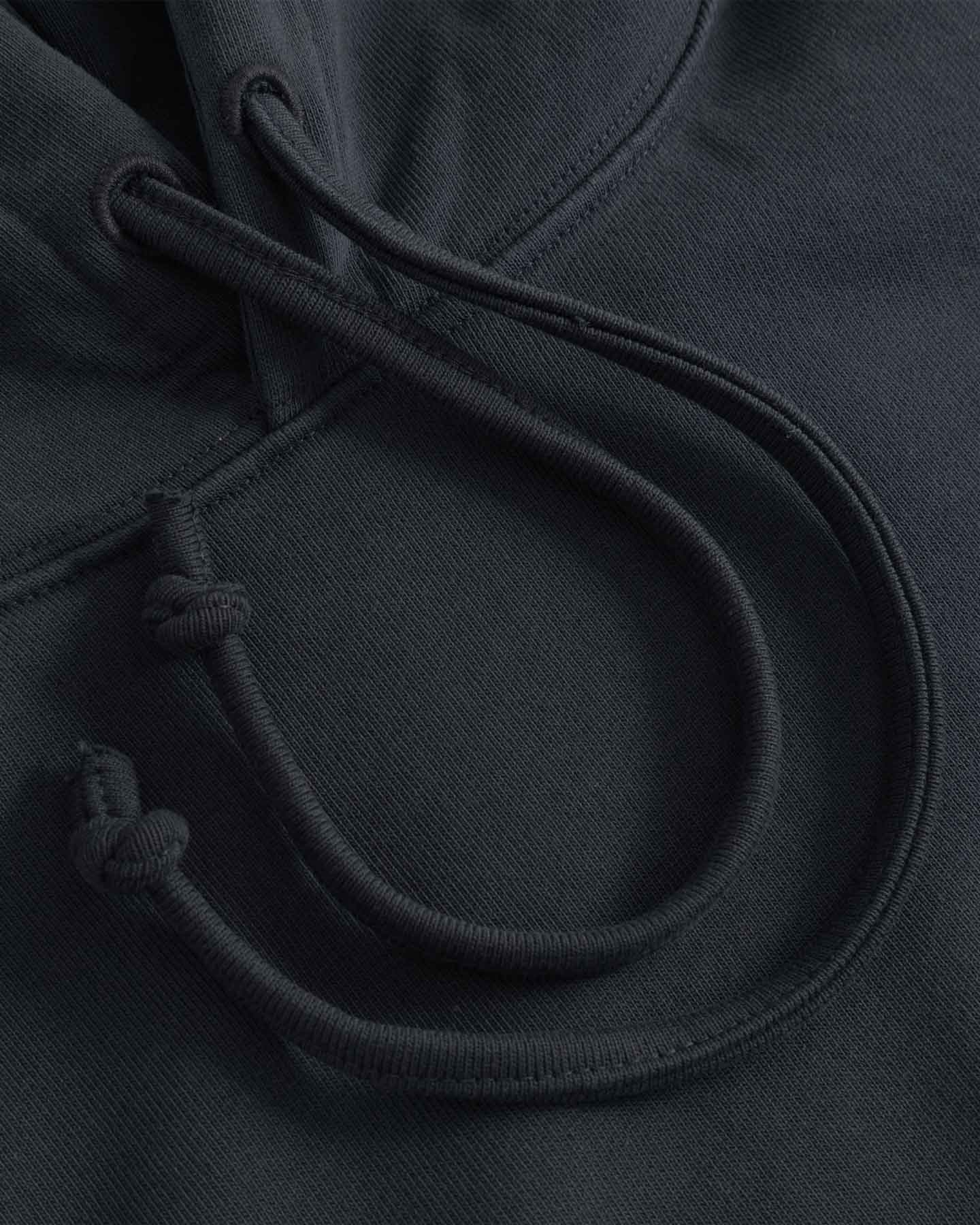 Close-up of black hoodie with drawstring