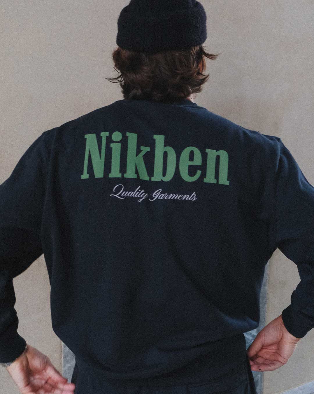 black sweatshirt with Nikben logo in green