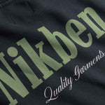 Close up of Text 'Nikben Quality Garments' on a back