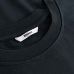 Black t-shirt with a Nikben label on the collar
