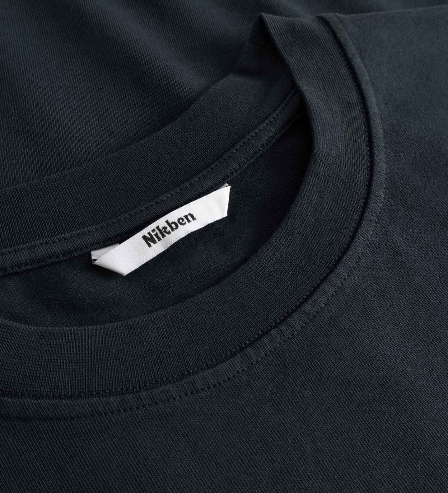 Black t-shirt with a Nikben label on the collar
