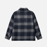 Backside of navy grey checkered shirt.
