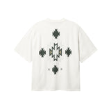 Back of white T-shirt with native inspired print in green and white