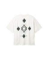 Back of white T-shirt with native inspired print in green and white