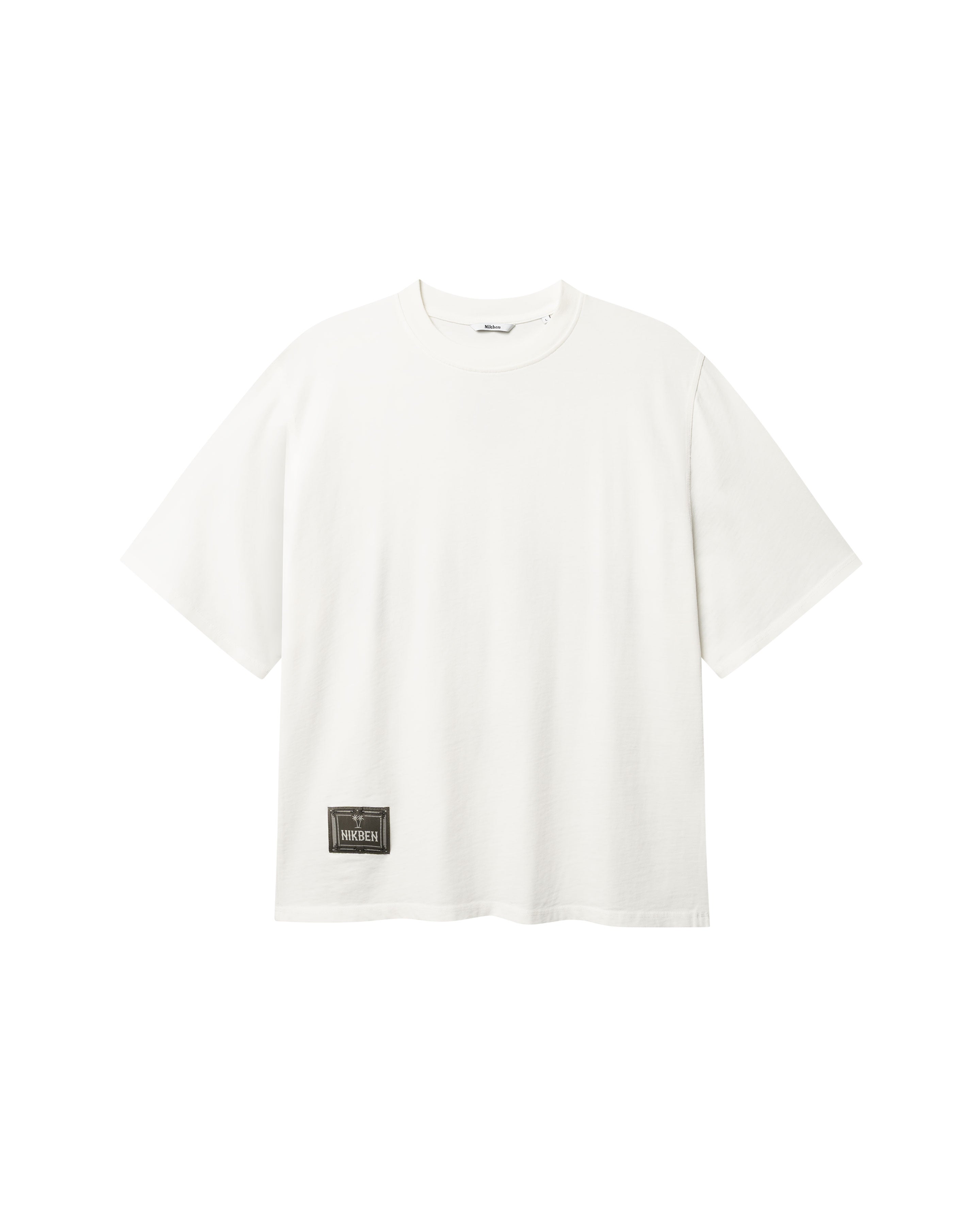 White T-shirt with green Nikben patch logo on the lower left side 