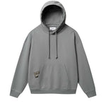 Grey hoodie with green Nikben patch label next to left pocket 