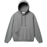 Grey hoodie with green Nikben patch label next to left pocket 