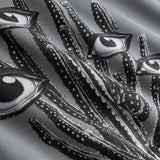 Closeup view of black and white cactus print on grey hoodie