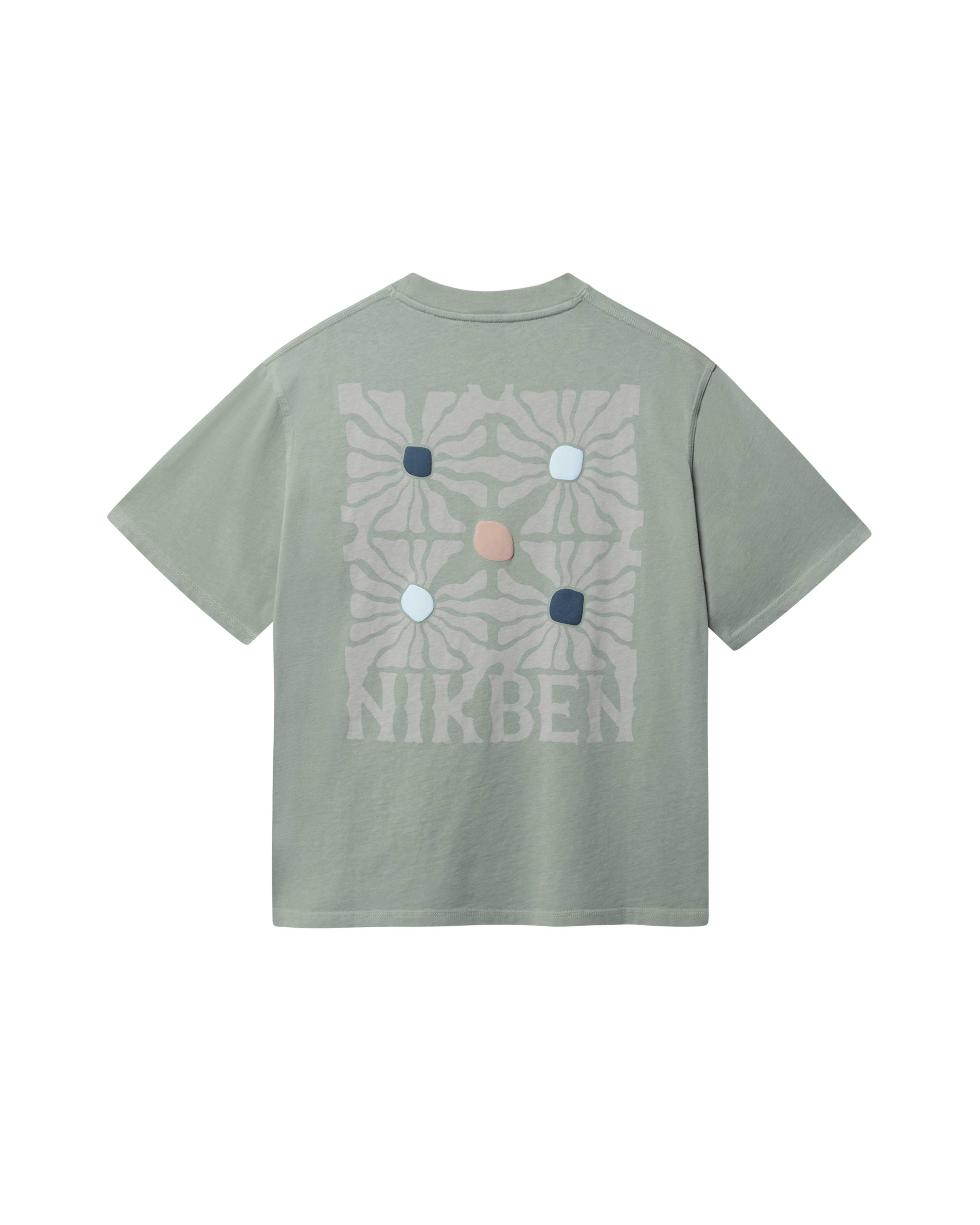 Green T-shirt with "NIKBEN" text and blue, brown and beige graphic print on the back