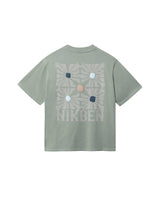 Green T-shirt with "NIKBEN" text and blue, brown and beige graphic print on the back