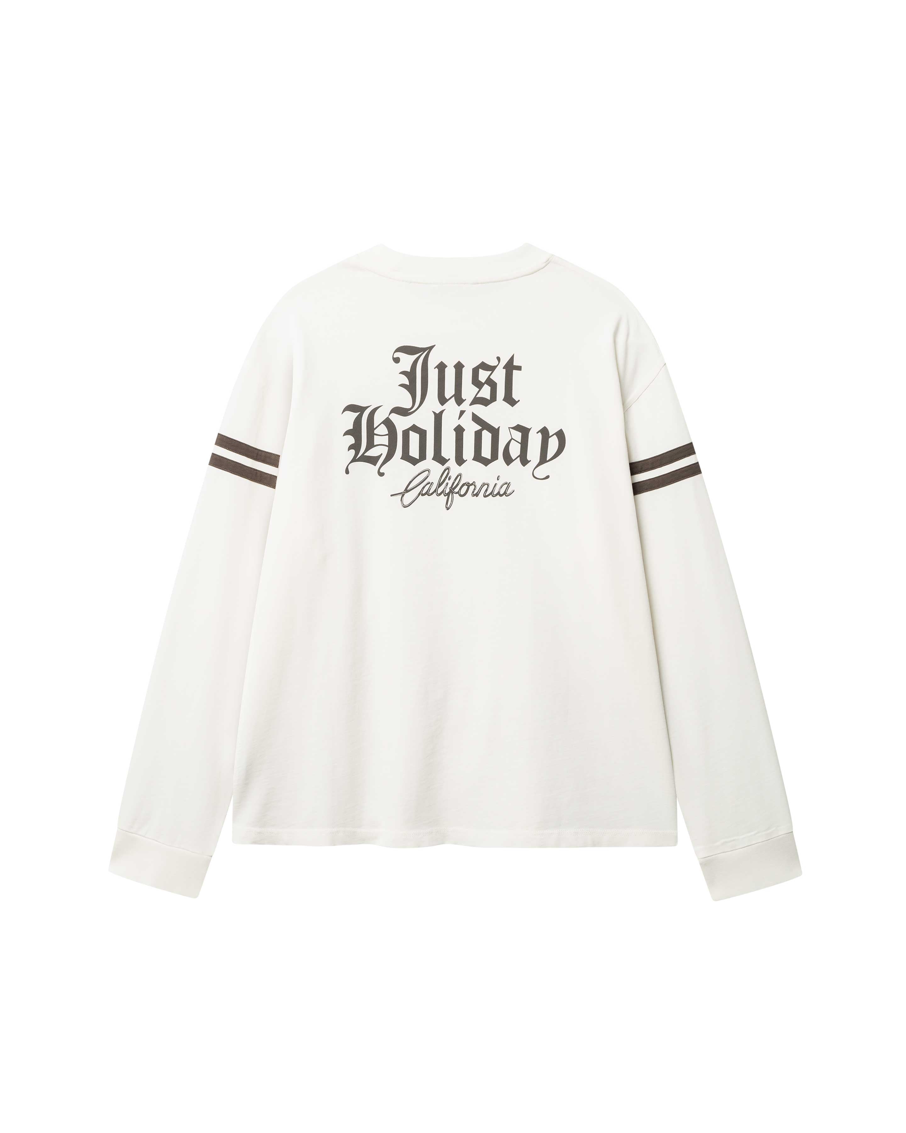 White longsleeve T-shirt with brown "JUST HOLIDAY" print on back and brown stripes on sleeves