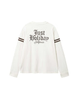 White longsleeve T-shirt with brown "JUST HOLIDAY" print on back and brown stripes on sleeves