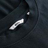 Closeup view of Nikben necklabel on black longsleeve T-shirt